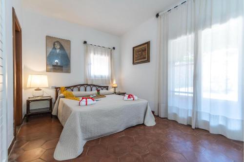 Postel nebo postele na pokoji v ubytování Casa Corsara - Happy Rentals