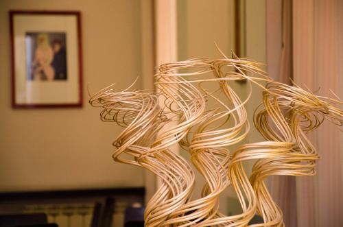 a close up of a sculpture made of wicker at Hotel Garda in Rome