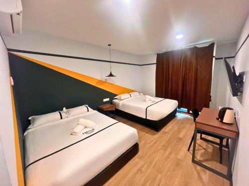Ένα ή περισσότερα κρεβάτια σε δωμάτιο στο Seeds Hotel Damansara Pelangi