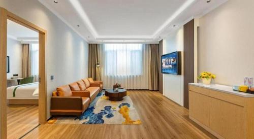 Μια τηλεόραση ή/και κέντρο ψυχαγωγίας στο GreenTree Inn Hebei Langfang Bazhou Railway Station West Yingbin Road Express Hotel