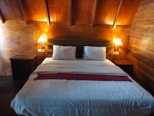 Cama o camas de una habitación en Girang Rinjani Bungalows