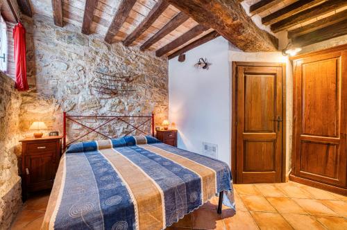 Ένα ή περισσότερα κρεβάτια σε δωμάτιο στο Rosa - Agriturismo Fogliani