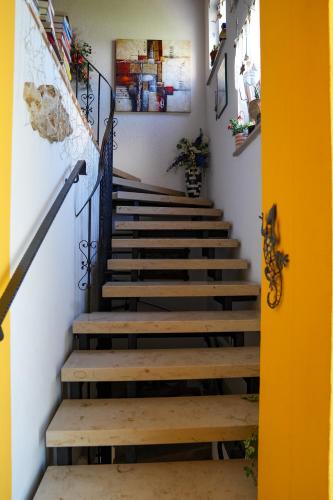 a staircase in a house with wooden steps at Pension Eger in Treuchtlingen