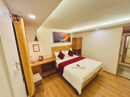 Postel nebo postele na pokoji v ubytování RIO ROOMS Medical College
