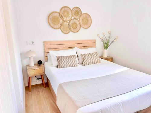 Ein Bett oder Betten in einem Zimmer der Unterkunft First line with ocean views
