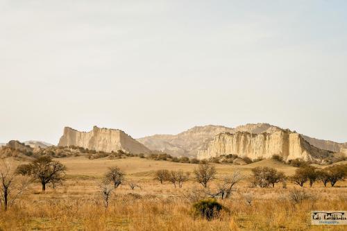 a view of a desert with mountains in the background at Guest House BALU in Kutaisi