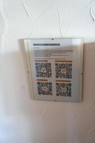 a book is taped to a wall at Pension Eger in Treuchtlingen