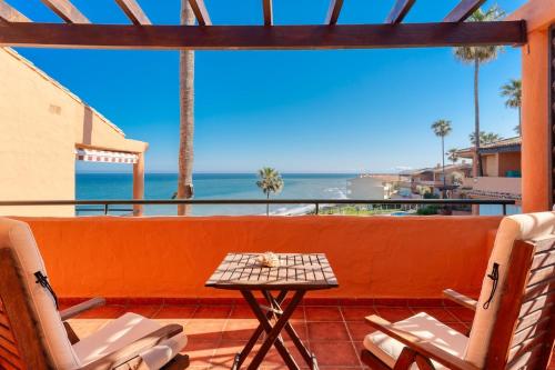 Beachfront 3BR Townhouse with pool in Estepona