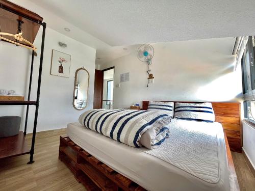 Ein Bett oder Betten in einem Zimmer der Unterkunft Motel An Nguyên Đà Lạt