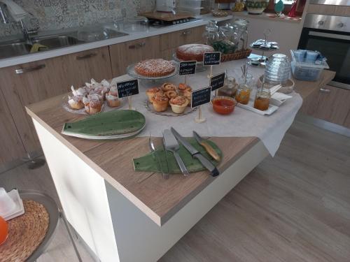 a table with many different types of food on it at La Dimora del Croccio - Gole del Calore in Felitto