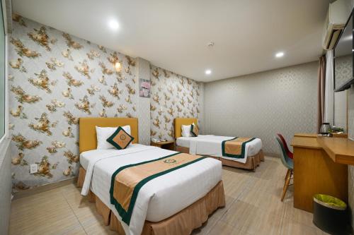 Camila Airport Hotelにあるベッド
