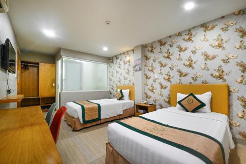 Camila Airport Hotelにあるベッド