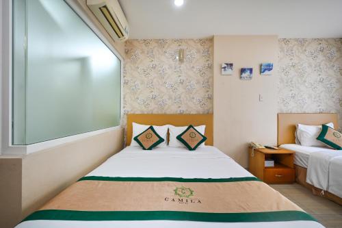 Camila Airport Hotelにあるベッド