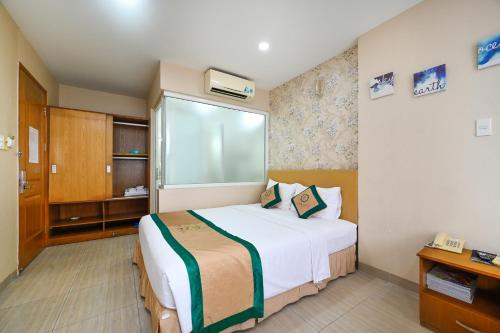 Camila Airport Hotelにあるベッド