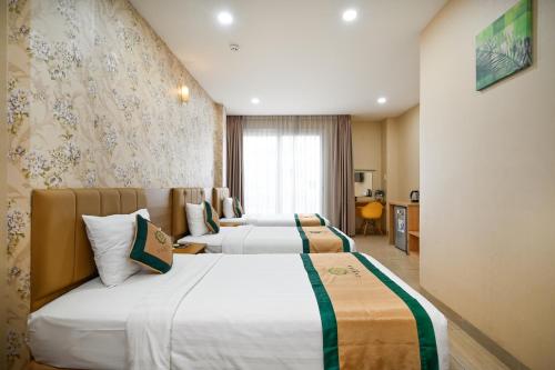 Camila Airport Hotelにあるベッド