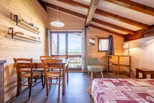 Кровать или кровати в номере Studio 17 - Le Tetras