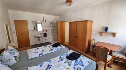 Katil atau katil-katil dalam bilik di Mosel View Old Town Apartments