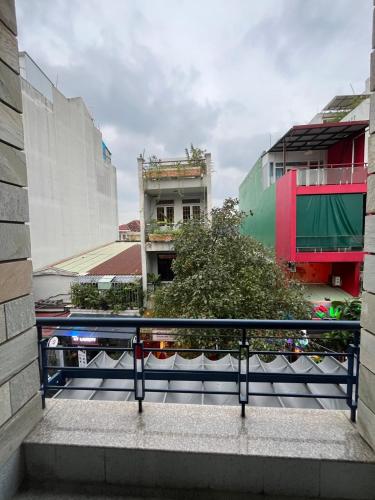 a stairway in a city with buildings at Spacious studio with a large balcony in Thao Dien R02 in Ho Chi Minh City