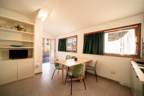 Residence Le Grazie Estにあるテレビまたはエンターテインメントセンター