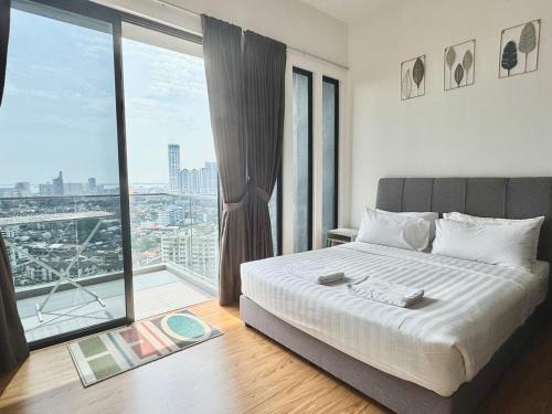 Кровать или кровати в номере Beacon Executive Suites #Executive #SkyPool #Georgetown #6pax #2BR 2bath #1Queen 4Single #Quality well maintained #Private host