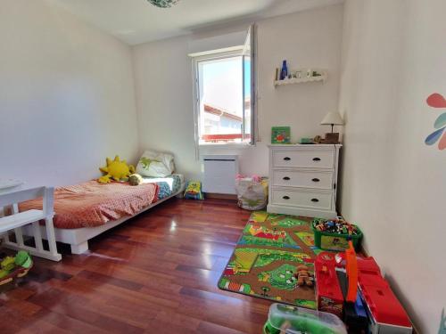 Katil atau katil-katil dalam bilik di Appartement vue Rhune - Piscine