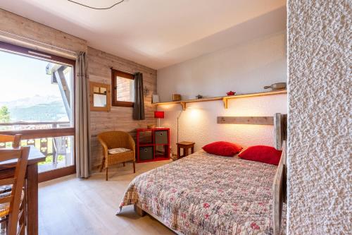 Ένα ή περισσότερα κρεβάτια σε δωμάτιο στο Studio 13 - L'Étale