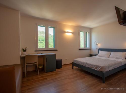 Postel nebo postele na pokoji v ubytování Affittacamere MontAle