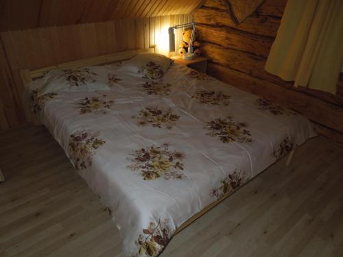 Ліжко або ліжка в номері Hinni Talu Puhkemaja