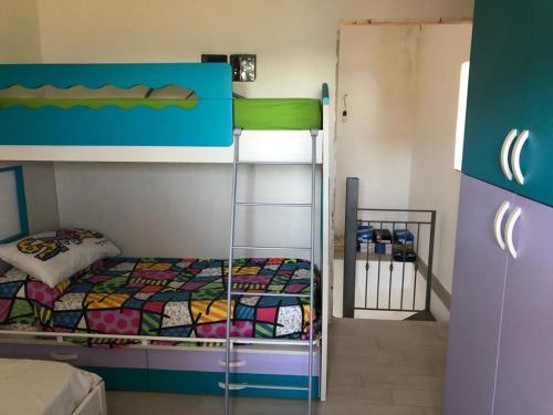 Postel nebo postele na pokoji v ubytování Casa vacanze nel Cilento