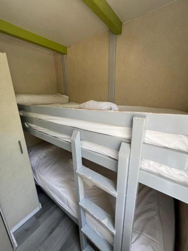 a bunk room with two bunk beds in it at Camping Costa Blanca in El Campello