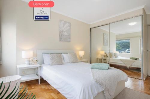Ένα ή περισσότερα κρεβάτια σε δωμάτιο στο 1 Bed Apt By One Luxe Stay Serviced Apartment & Vacation Rental Manly BEACH, Northern Beaches, Sydney With Free WiFi