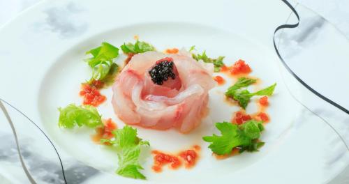 a plate of food with shrimp and vegetables on it at Villa The Club 御殿場ウエスト in Gotemba