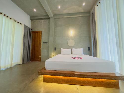 Cama o camas de una habitación en Tarragon Leisure