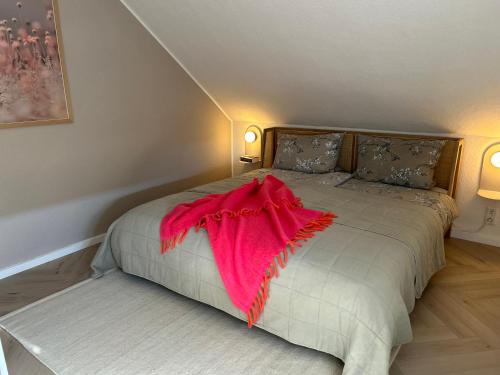 เตียงในห้องที่ Nordwärts 53Grad Ferienwohnung in Burhave, Nordsee