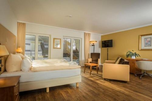 Postel nebo postele na pokoji v ubytování Business-Apartment 1 mit Küche & kostenfreiem Parkplatz