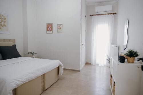 Postel nebo postele na pokoji v ubytování Casa Centro Kilkis