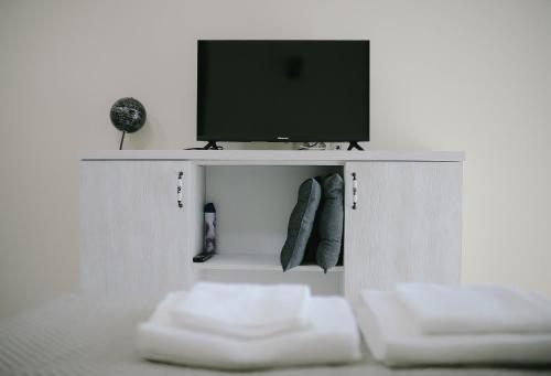 TV a/nebo společenská místnost v ubytování Skyline Apartments