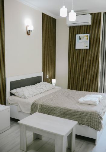 Postel nebo postele na pokoji v ubytování Skyline Apartments