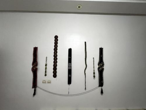 a wall with three different types of tools on it at Suite 2 in Marrakech