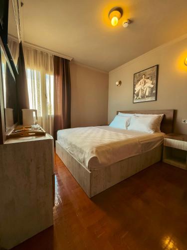 Katil atau katil-katil dalam bilik di Tare Suites