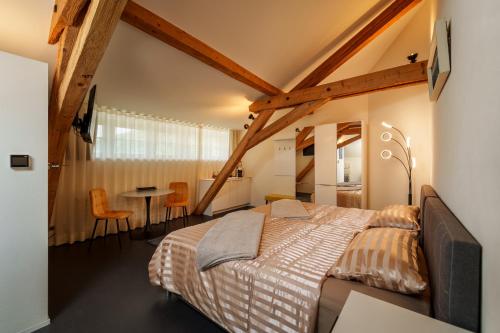 Postel nebo postele na pokoji v ubytování Le Relais du Simplon