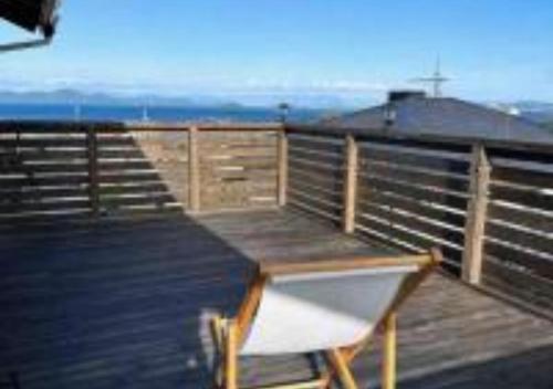 a wooden deck with a bench on top of it at 三米-鶴舞琵琶湖-biwako in Otsu