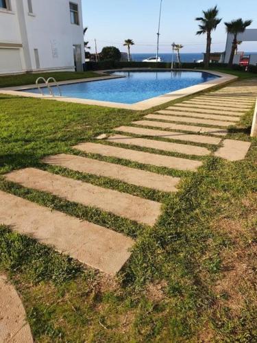 La alberca dentro o cerca de Appartement de plage front de mer