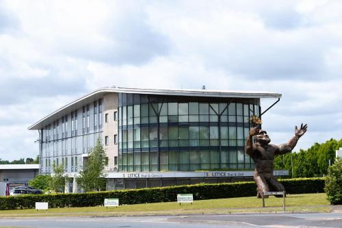 a statue in front of a building at Holiday Inn Salisbury - Stonehenge by IHG in Salisbury