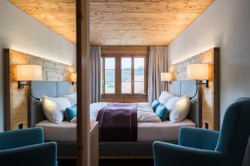 Postel nebo postele na pokoji v ubytování Hotel Mulin by Amanthos