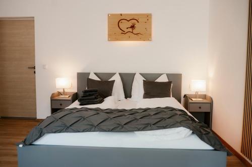 Postel nebo postele na pokoji v ubytování CLAUS RESCH APPARTEMENTS