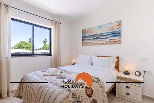 Ένα ή περισσότερα κρεβάτια σε δωμάτιο στο #321 Lageado 1S by Home Holidays