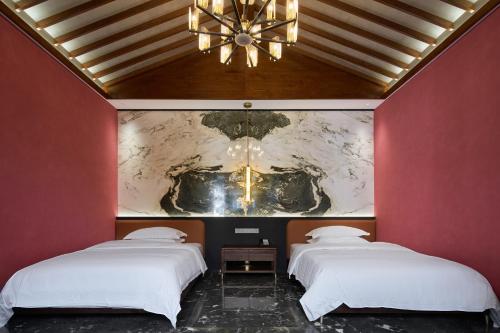 Katil atau katil-katil dalam bilik di Moonrise Hotels Resorts
