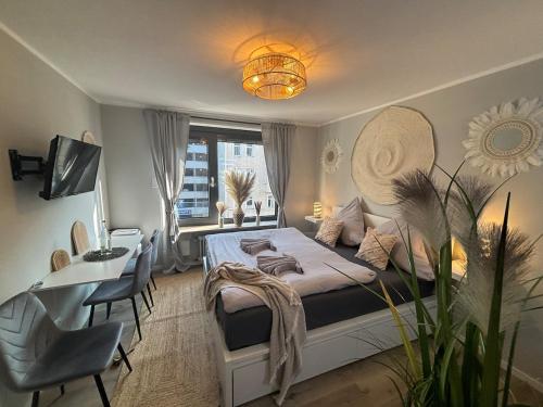 Postel nebo postele na pokoji v ubytování Bohemian Chic Selfie Suite - Munich Central Station