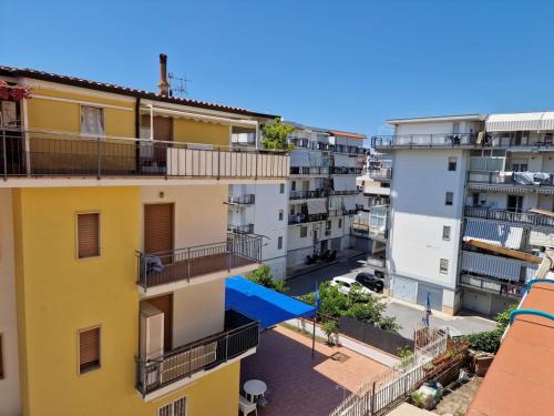 an aerial view of a city with buildings at Apartman SOFIA - close to the railway station in Scalea